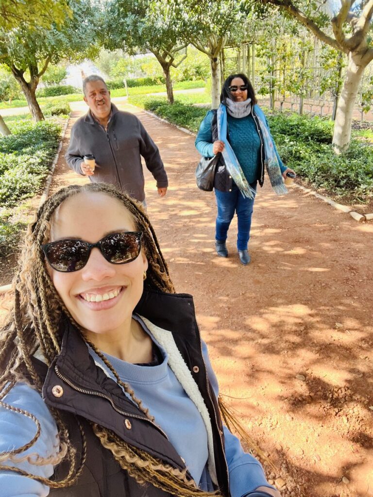Kirstin Arendse walking outdoors with family